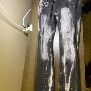 Flashy designed paint smeared jeans